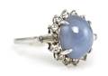 A Platinum Star Sapphire and Diamond Ring