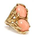 A 14 Karat Yellow Gold and Pink Coral Ring