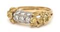 An 18 Karat Yellow Gold and Diamond Band