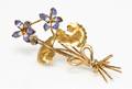 An 18 Karat Yellow Gold and Polychrome Enamel Flower Brooch