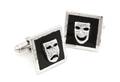 A Pair of Sterling Silver and Black Enamel Theater Face Cufflinks