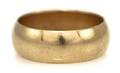 A 14 Karat Yellow Gold Half Round Band