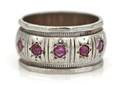 A 14 Karat White Gold and Ruby Band