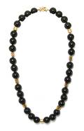 A Single Strand Onyx Bead Necklace with 14 Karat Yellow Gold Beads and Clasp