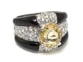 An 18 Karat White Gold Heliodor Diamond and Onyx Ring