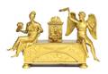 An Empire Gilt Bronze Figural Music Box