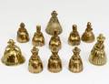 GROUP OF ELEVEN FIGURAL BRASS DINNER BELLS