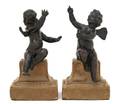 A Pair of Continental Patinated Bronze Figures