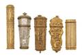 A Collection of Five Continental Gilt Metal Lighters and Lighter Cases