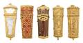 A Collection of Four Continental Gilt Metal Mounted Lighters
