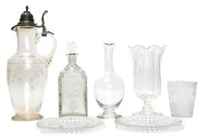 A Set of Twelve Cut Glass Salad Plates