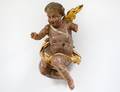 CARVED PAINTED AND GILT WOOD ANGEL
