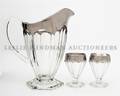 An Art Deco Style Silvered Glass Seven Piece Drink Set