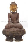 A Carved and Gilt Wood Figure of Buddha