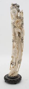A Chinese Carved Ivory Figure of a Beauty