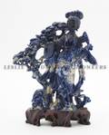 A Chinese Carved Lapis Lazuli Figure