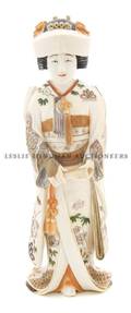 A Japanese Carved Ivory Figure of a Maiden