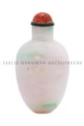 A Carved Jadeite Snuff Bottle