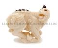 A Carved Ivory Netsuke