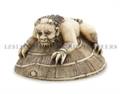 A Carved Ivory Netsuke