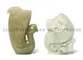 A Jade Toggle of a Bird and Rhyton Jade Cup