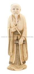 A Japanese Carved Ivory of a Scholar