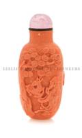 A Carved Coral Snuff Bottle