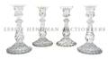 A Set of Four French Glass Candlesticks Baccarat