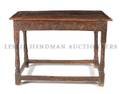 A Jacobean Revival Carved Oak Low Table