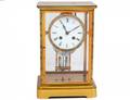 BRASS GLASS AND ENAMEL CLOCK