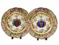 TWO NAPLES PORCELAIN ARMORIAL CHARGERS