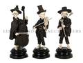 A Set of Three Continental Ivory and Wood Figures of Musicians