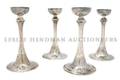 A Set of Four American Hand Hammered Candlesticks Lebolt