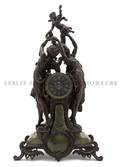 An Art Nouveau Cast Metal Figural Clock