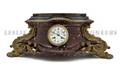 A Louis XVI Style Gilt Bronze and Marble Mantel Clock