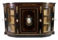 A Napoleon III Ebonized and Sevres Style Porcelain PlaqueMounted Sideboard