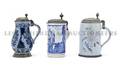 A Group of Three Continental Pewter Mounted Faience Tankards