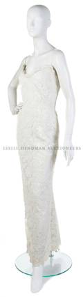 A Strapless White Lace Evening Gown
