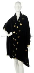 A Black Velvet and Brass Grommet Shawl