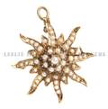 A 14 Karat Yellow Gold and Seed Pearl PendantBrooch