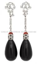 A Pair of 18 Karat White Gold Diamond Coral and Onyx Earrings