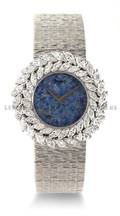 An 18 Karat White Gold Diamond and Black Opal Mechanical Wristwatch Piaget