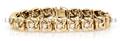 An 18 Karat Yellow Gold and Diamond Line Bracelet