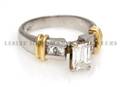 A Platinum 18 Karat Yellow Gold and Diamond Ring
