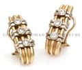 A Pair of 14 Karat Yellow Gold and Diamond Earrings
