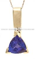 A 14 Karat Yellow Gold Tanzanite and Diamond Pendant