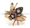 A 14 Karat Yellow Gold Diamond and Sapphire Ring in an Insect Motif