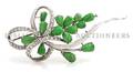A 14 Karat White Gold and Dyed Jade Brooch