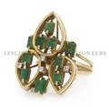 A 14 Karat Yellow Gold Emerald and Diamond Ring