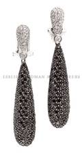 A Pair of 14 Karat White Gold and White and Black Diamond Earrings